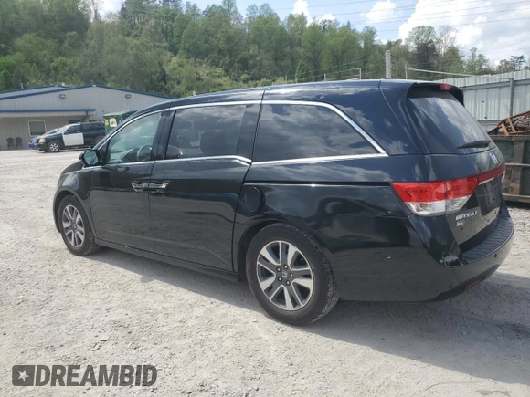 2016 Honda Odyssey Touring Elite with VIN 5FNRL5H97GB038917, listed as a Copart auction lot 54479375 with 165,432 mi miles and Salvage Title. Bid and sale history available at DreamBid. Image 2.
