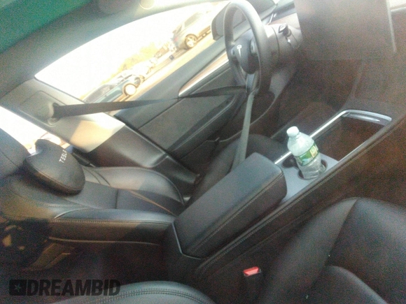 2023 Tesla Model 3 z VIN 5YJ3E1EA3PF449187, wystawiony jako IAAI lot #40320939 z przebiegiem Nie podano mil oraz . Historia ofert i sprzedaży dostępna na DreamBid. Obrazek 4.