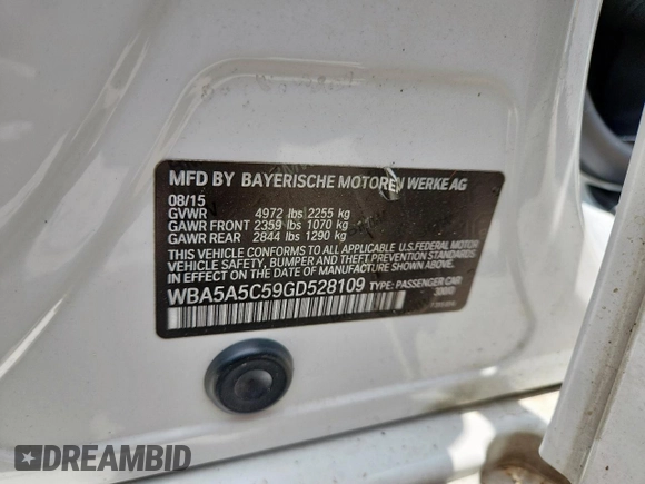 2016 BMW 5 Series 528i with VIN WBA5A5C59GD528109, listed as a Copart auction lot 61691405 with 107,837 mi miles and Salvage title. Bid and sale history available at DreamBid. Image 12.