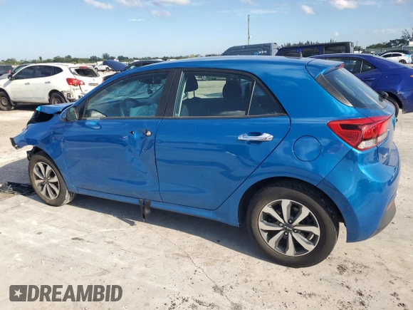 2023 Kia Rio S with VIN 3KPA25AD9PE548173, listed as a Copart auction lot 50232915 with 26,668 mi miles and Salvage Title. Bid and sale history available at DreamBid. Image 2.