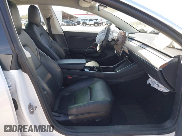 2020 Tesla Model 3 Long Range with VIN 5YJ3E1EB4LF619754, listed as a IAAI auction lot 41920422 with 82,430 mi miles and . Bid and sale history available at DreamBid. Image 5.
