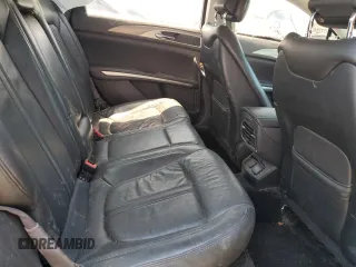 2014 Lincoln MKZ Hybrid z VIN 3LN6L2LU3ER806204, wystawiony jako Copart lot #56291185 z przebiegiem 258 082 mil mil oraz Szkoda całkowita • Salvage title. Historia ofert i sprzedaży dostępna na DreamBid. Obrazek 10.