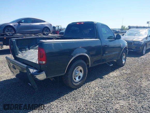 2002 Ford F-150 XL with VIN 1FTRF17W52KE24870, listed as a IAAI auction lot 42024831 with 319,578 mi miles and . Bid and sale history available at DreamBid. Image 4.