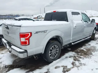 2018 Ford F-150 XL with VIN 1FTFW1E54JKC59793, listed as a IAAI auction lot 41558134 with 217,831 mi miles. Bid and sale history available at carsss.com. Image 4.