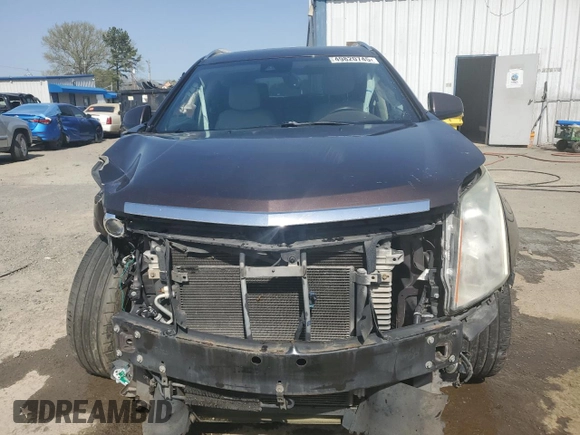 2015 Cadillac SRX Performance Collection z VIN 3GYFNCE30FS533686, wystawiony jako Copart lot #49820745 z przebiegiem 134 363 mil mil oraz Szkoda całkowita • Salvage title. Historia ofert i sprzedaży dostępna na DreamBid. Obrazek 5.