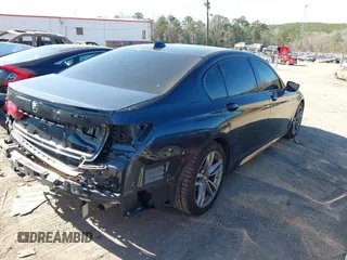 2017 BMW 7 Series 740i z VIN WBA7E2C57HG739465, wystawiony jako IAAI lot #41764778 z przebiegiem 84 814 mil mil oraz . Historia ofert i sprzedaży dostępna na DreamBid. Obrazek 4.