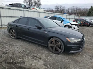 2015 Audi A6 3.0T Prestige with VIN WAUHGAFC9FN012002, listed as a Copart auction lot 51473995 with 140,266 mi miles and Clean Title. Bid and sale history available at carsss.com. Image 4.