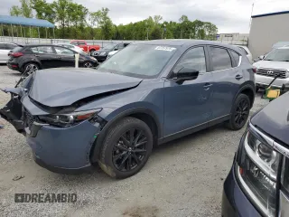 2023 Mazda CX-5 S Carbon Edition z VIN JM3KFBCM6P0214123, wystawiony jako Copart lot #53157975 z przebiegiem 30 026 mil mil oraz Szkoda całkowita • Salvage title. Historia ofert i sprzedaży dostępna na DreamBid. Obrazek 1.