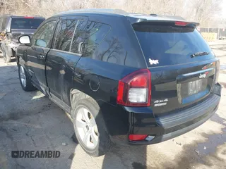 2014 Jeep Compass Latitude with VIN 1C4NJDEBXED661930, listed as a IAAI auction lot 41501558 with 94,133 mi miles and . Bid and sale history available at DreamBid. Image 3.