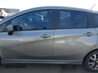 2015 Nissan Note S with VIN 3N1CE2CP0FL447865, listed as a IAAI auction lot 41578442 with 90,837 mi miles and . Bid and sale history available at DreamBid. Image 13.
