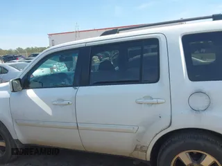 2011 Honda Pilot EX-L with VIN 5FNYF3H64BB027265, listed as a IAAI auction lot 41901424 with 198,556 mi miles and . Bid and sale history available at DreamBid. Image 14.