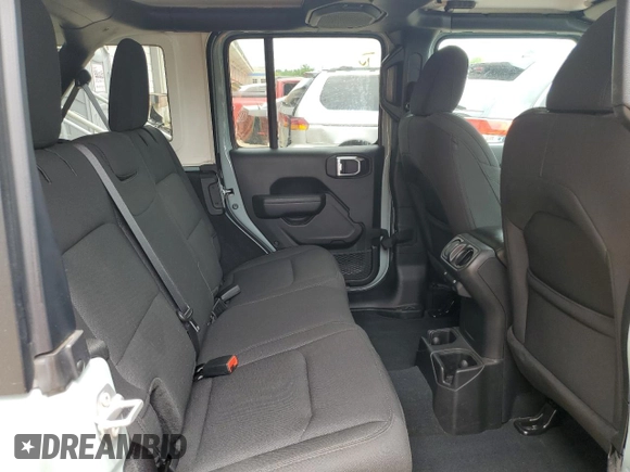 2023 Jeep Wrangler Sport with VIN 1C4HJXDN0PW643485, listed as a Copart auction lot 59783564 with 14,001 mi miles and Salvage Title. Bid and sale history available at DreamBid. Image 11.