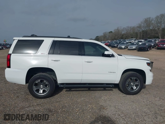 2017 Chevrolet Tahoe LT with VIN 1GNSKBKCXHR350028, listed as a IAAI auction lot 41684954 with 117,261 mi miles and . Bid and sale history available at DreamBid. Image 14.