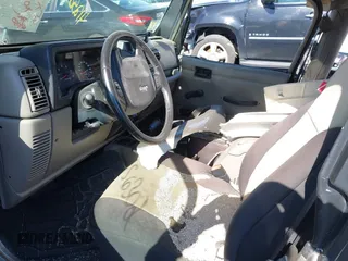 2004 Jeep Wrangler Sahara with VIN 1J4FA59S14P772264, listed as a IAAI auction lot 41814074 with 165,750 mi miles and . Bid and sale history available at DreamBid. Image 5.
