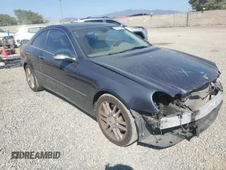 2009 Mercedes-Benz CLK 350 with VIN WDBTJ56H99F261060, listed as a Copart auction lot 69812004 with 105,218 mi miles and Salvage Title. Bid and sale history available at carsss.com. Image 4.
