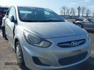 2013 Hyundai Accent GLS with VIN KMHCT4AE4DU477465, listed as a IAAI auction lot 41930256 with 48,877 mi miles. Bid and sale history available at carsss.com. Image 1.