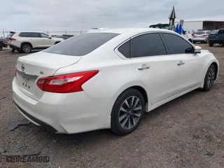 2017 Nissan Altima 2.5 SR with VIN 1N4AL3AP7HC120659, listed as a IAAI auction lot 40816224 with 131,721 mi miles. Bid and sale history available at carsss.com. Image 4.