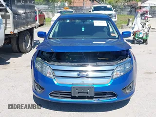 2012 Ford Fusion SE z VIN 3FAHP0HG4CR276627, wystawiony jako IAAI lot #42348303 z przebiegiem 160 922 mil mil oraz . Historia ofert i sprzedaży dostępna na DreamBid. Obrazek 13.