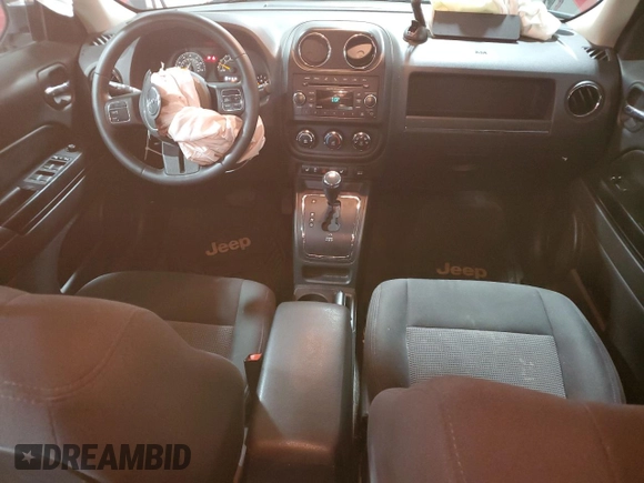 2014 Jeep Patriot Latitude with VIN 1C4NJRFB7ED855780, listed as a Copart auction lot 57246515 with 110,433 mi miles and Salvage title. Bid and sale history available at DreamBid. Image 8.