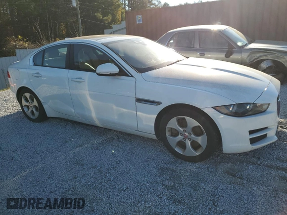 2018 Jaguar XE 25t with VIN SAJAR4FX7JCP27482, listed as a Copart auction lot 81964804 with 129,113 mi miles and Clean Title. Bid and sale history available at carsss.com. Image 4.