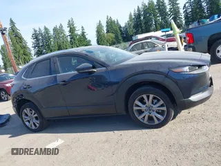 2023 Mazda CX-30 S Select with VIN 3MVDMBBM4PM558831, listed as a IAAI auction lot 42432750 with 12,468 mi miles and . Bid and sale history available at DreamBid. Image 14.