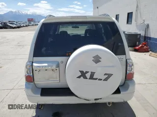 2004 Suzuki XL7 LX z VIN JS3TX92V344101698, wystawiony jako Copart lot #54610825 z przebiegiem 118 152 mil mil oraz Szkody całkowita. Historia ofert i sprzedaży dostępna na DreamBid. Obrazek 6.