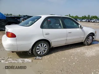 2002 Toyota Corolla CE with VIN 1NXBR12E32Z592708, listed as a Copart auction lot 62866195 with 226,871 mi miles and Clean title. Bid and sale history available at DreamBid. Image 3.