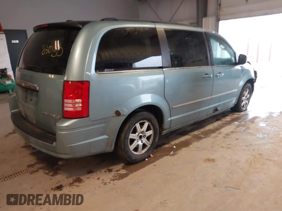2010 Chrysler Town & Country Touring with VIN 2A4RR5D12AR284617, listed as a IAAI auction lot 41684030 with 199,414 mi miles. Bid and sale history available at carsss.com. Image 4.