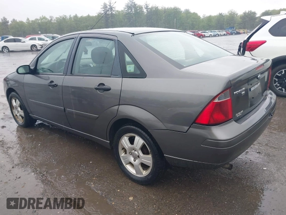 2007 Ford Focus S z VIN 1FAFP34N77W336075, wystawiony jako IAAI lot #42325783 z przebiegiem 153 194 mil mil oraz . Historia ofert i sprzedaży dostępna na DreamBid. Obrazek 3.