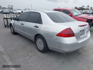 2007 Honda Accord Sdn VP with VIN JHMCM56117C017041, listed as a IAAI auction lot 42033947 with 231,586 mi miles. Bid and sale history available at carsss.com. Image 3.