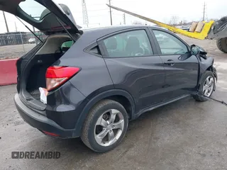 2017 Honda HR-V LX with VIN 3CZRU6H3XHM714198, listed as a IAAI auction lot 41490988 with 122,643 mi miles. Bid and sale history available at carsss.com. Image 4.