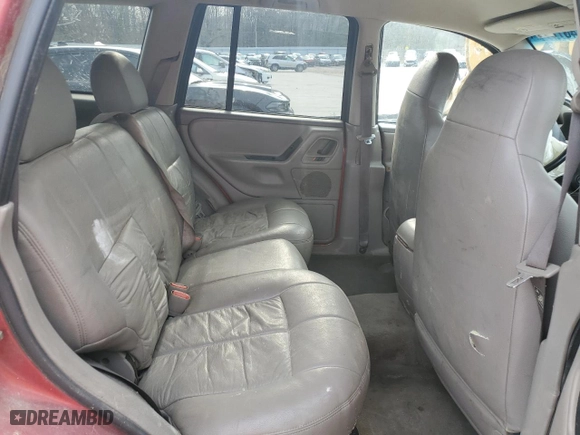 2004 Jeep Grand Cherokee Laredo with VIN 1J4GX48S14C302550, listed as a Copart auction lot 48757145 with 182,614 mi miles and Salvage Title. Bid and sale history available at carsss.com. Image 11.