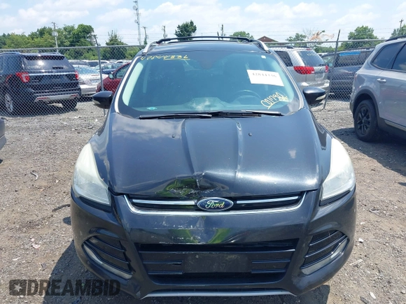 2015 Ford Escape Titanium with VIN 1FMCU9J96FUC01790, listed as a IAAI auction lot 42844336 with 133,005 mi miles and . Bid and sale history available at DreamBid. Image 12.