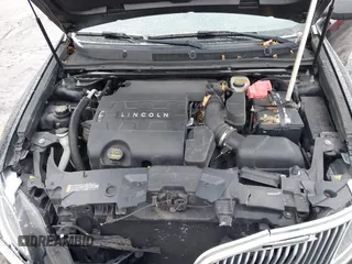 2014 Lincoln MKS with VIN 1LNHL9EK3EG601471, listed as a IAAI auction lot 41142126 with 110,432 mi miles. Bid and sale history available at carsss.com. Image 10.