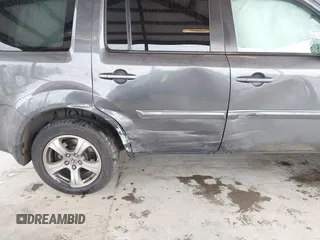 2015 Honda Pilot EX-L with VIN 5FNYF4H50FB030652, listed as a IAAI auction lot 41937401 with 91,429 mi miles and . Bid and sale history available at carsss.com. Image 6.