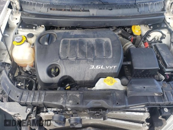 2015 Dodge Journey SXT with VIN 3C4PDCCGXFT681079, listed as a Copart auction lot 46429805 with 104,767 mi miles and Salvage title. Bid and sale history available at DreamBid. Image 11.