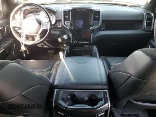 2021 Ram 1500 Laramie with VIN 1C6SRFJT3MN677537, listed as a Copart auction lot 57936295 with Not provided miles and Salvage title. Bid and sale history available at DreamBid. Image 8.