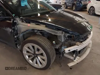 2022 Tesla Model 3 with VIN 5YJ3E1EA4NF187113, listed as a IAAI auction lot 41712331 with 81,879 mi miles and . Bid and sale history available at DreamBid. Image 21.