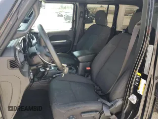 2023 Jeep Wrangler Willys with VIN 1C4HJXDN0PW631045, listed as a Copart auction lot 60109565 with 31,095 mi miles and Salvage title. Bid and sale history available at DreamBid. Image 7.
