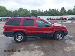 2003 Jeep Grand Cherokee Laredo with VIN 1J4GW48S73C611070, listed as a IAAI auction lot 42319030 with 177,771 mi miles and . Bid and sale history available at DreamBid. Image 13.