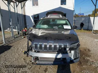 2019 Jeep Cherokee Latitude Plus with VIN 1C4PJMLB1KD101186, listed as a IAAI auction lot 40550461 with 73,986 mi miles. Bid and sale history available at carsss.com. Image 13.