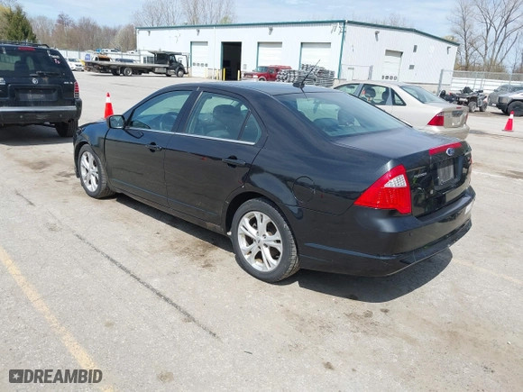 2012 Ford Fusion SE with VIN 3FAHP0HA8CR276237, listed as a IAAI auction lot 42048715 with 1,799,668 mi miles. Bid and sale history available at carsss.com. Image 3.