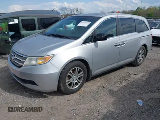 2012 Honda Odyssey EX-L with VIN 5FNRL5H68CB131431, listed as a IAAI auction lot 42012749 with 245,649 mi miles and . Bid and sale history available at carsss.com. Image 17.