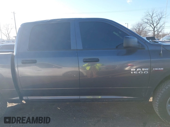 2015 Ram 1500 Express z VIN 1C6RR6KT6FS754869, wystawiony jako IAAI lot #41240025 z przebiegiem 203 775 mil mil oraz . Historia ofert i sprzedaży dostępna na DreamBid. Obrazek 13.