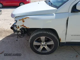 2016 Jeep Compass High Altitude with VIN 1C4NJDEB4GD767731, listed as a IAAI auction lot 41977400 with 99,890 mi miles and . Bid and sale history available at DreamBid. Image 6.