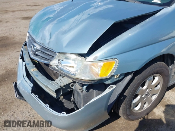 2003 Honda Odyssey EX-L with VIN 5FNRL18973B148675, listed as a IAAI auction lot 41992952 with 232,013 mi miles and . Bid and sale history available at DreamBid. Image 17.