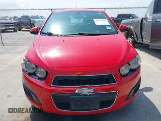 2014 Chevrolet Sonic LT with VIN 1G1JC6SH7E4135650, listed as a IAAI auction lot 41954694 with 103,944 mi miles. Bid and sale history available at carsss.com. Image 6.