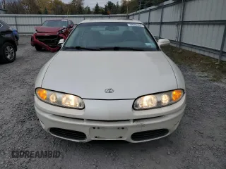 2001 Oldsmobile Aurora z VIN 1G3GS64CX14180971, wystawiony jako Copart lot #79035554 z przebiegiem 62 228 mil mil oraz Szkody całkowita. Historia ofert i sprzedaży dostępna na DreamBid. Obrazek 5.