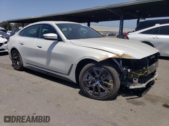2023 BMW i4 eDrive35 with VIN WBY43AW07PFP64892, listed as a Copart auction lot 55696614 with 3,491 mi miles and Salvage Title. Bid and sale history available at carsss.com. Image 4.