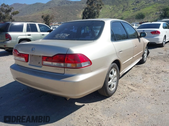 2001 Honda Accord EX z VIN JHMCG66801C014214, wystawiony jako IAAI lot #41643404 z przebiegiem 139 020 mil mil oraz . Historia ofert i sprzedaży dostępna na DreamBid. Obrazek 4.